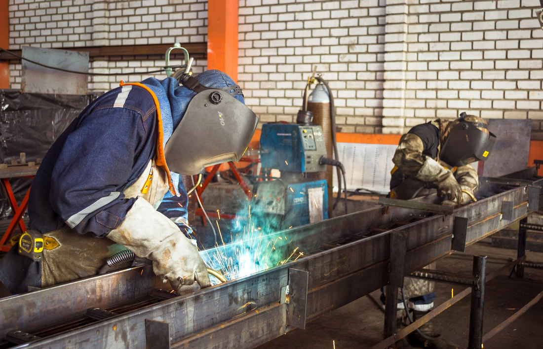 Steel beam fabrication